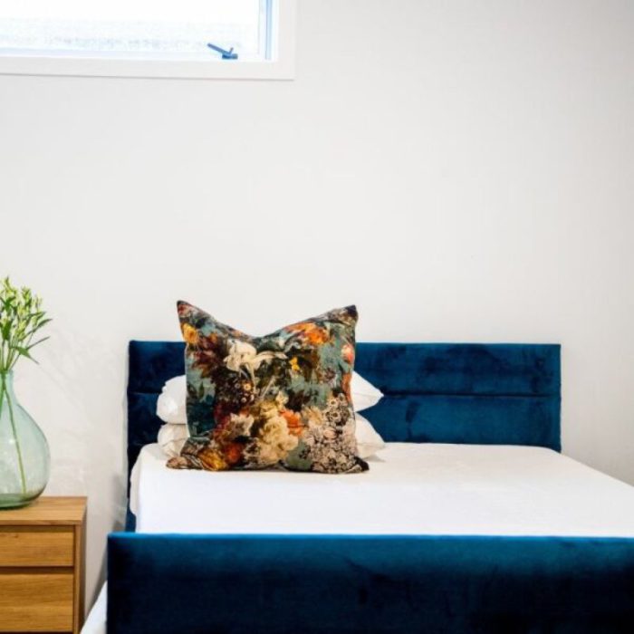 karlstead footboard royal blue on bed